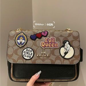 coach disney klare25